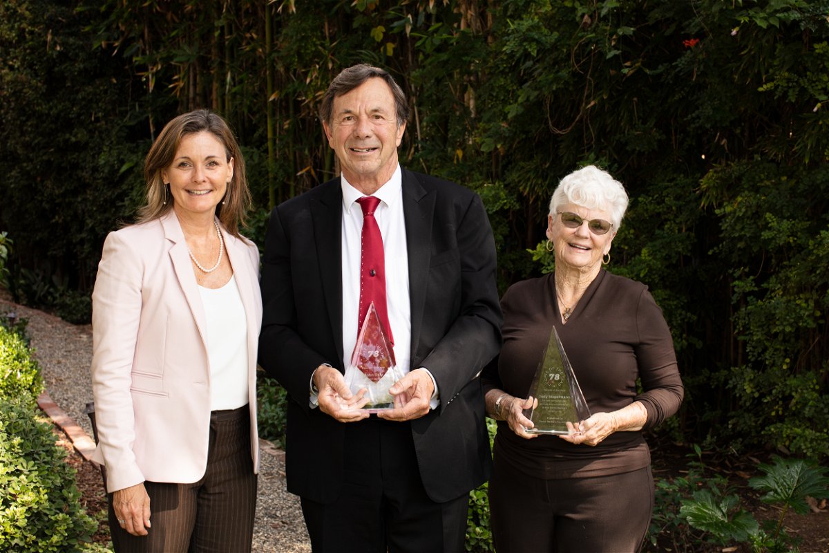 John Daly and Judith Staplemann were selected as the 78th People of the Year in 2021. Photo: (Left) Jackie Carrera, President & CEO of SBF, John Daly, and Judith Staplemann.