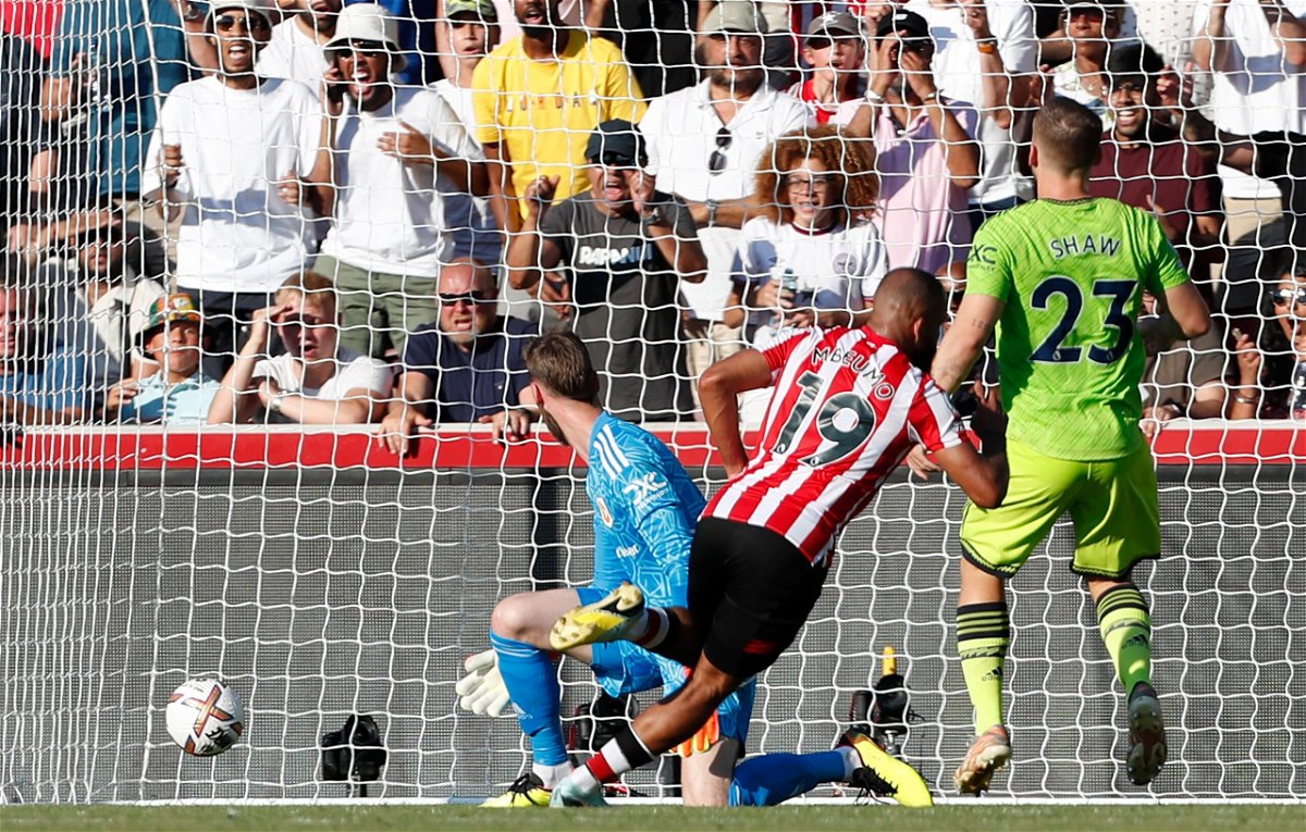 <i>IAN KINGTON/AFP/Getty Images</i><br/>Mbeumo scores Brentford's fourth against Manchester United.