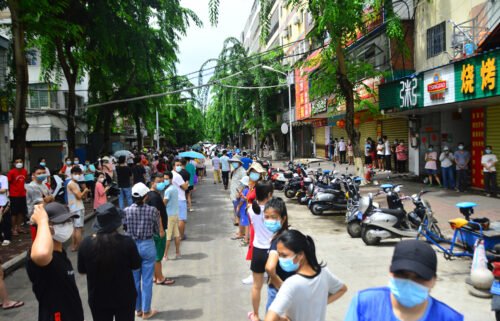 People line up for nucleic acid testing in Sanya