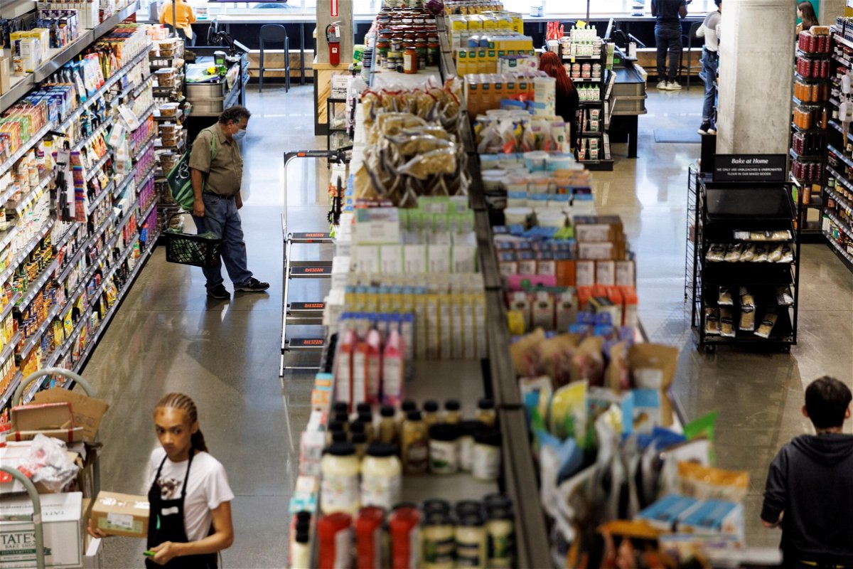 Customers shop at a supermarket in Washington