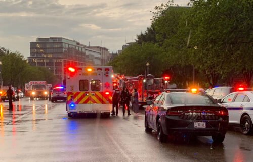 Authorities respond to the scene near Lafayette Park in Washington after a lightning strike injured four people.