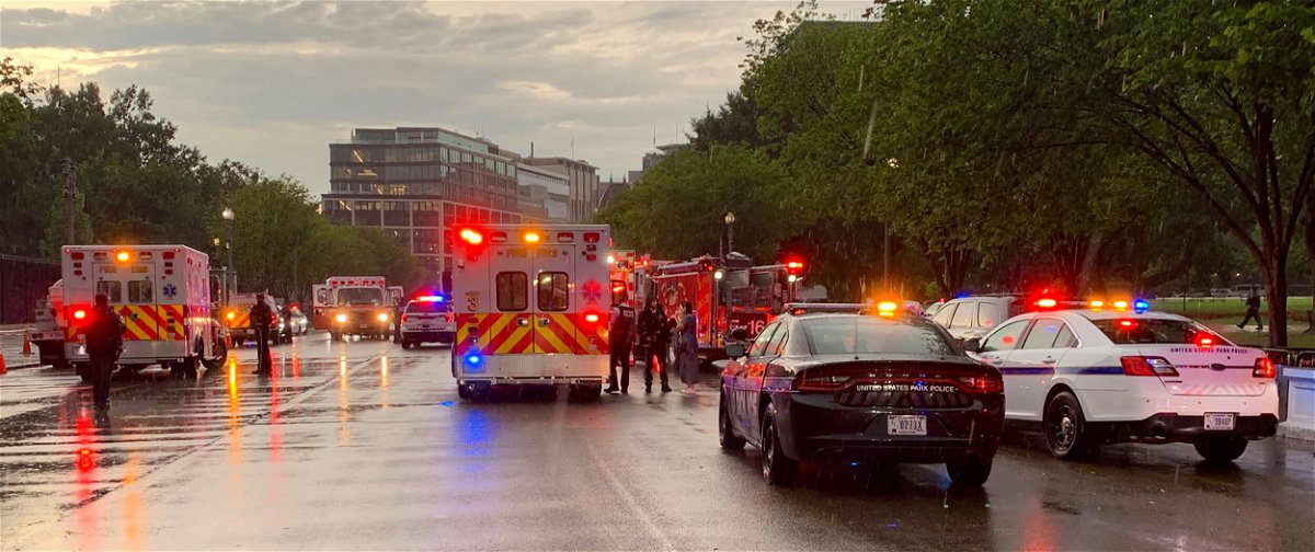 Authorities respond to the scene near Lafayette Park in Washington after a lightning strike injured four people.
