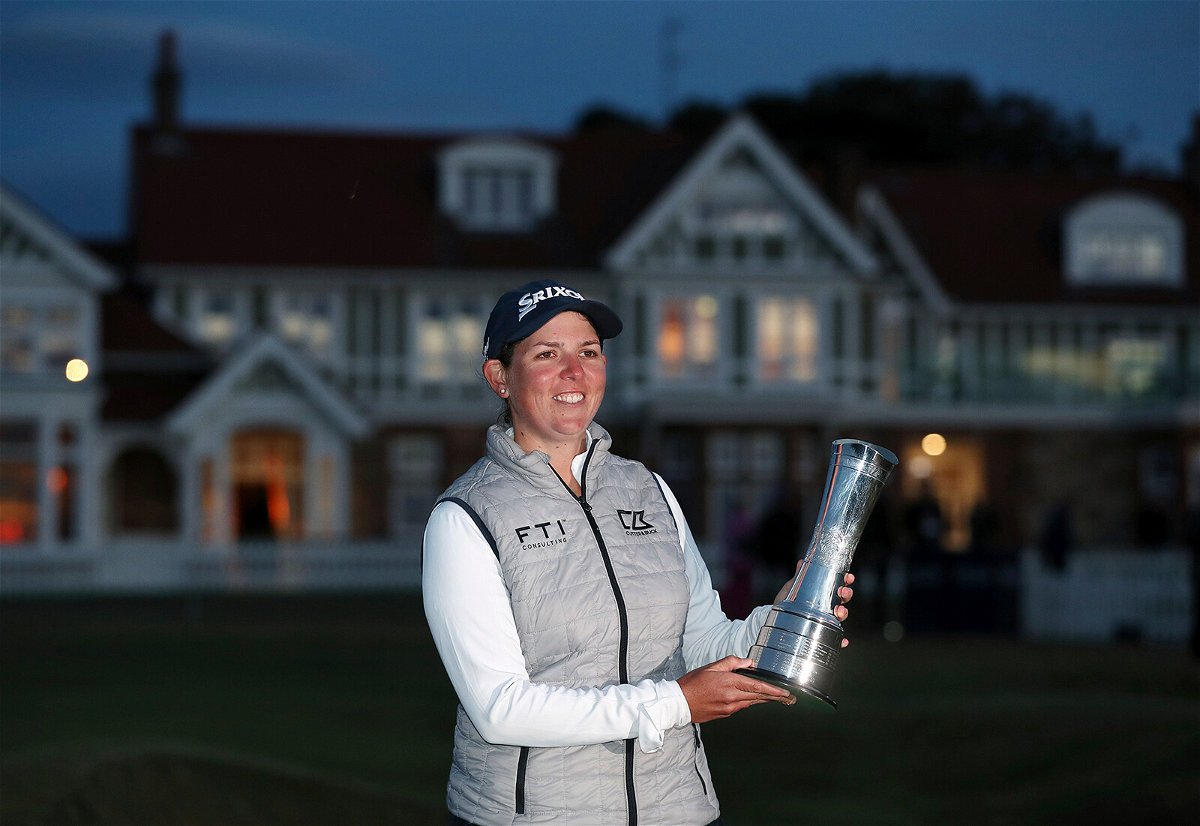 <i>Scott Heppell/Associated Press</i><br/>South Africa's Ashleigh Buhai poses with the trophy after winning the Women's British Open in Muirfield