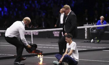 A protester lit a fire on the court at the Laver Cup at the O2 Arena in London on September 23.