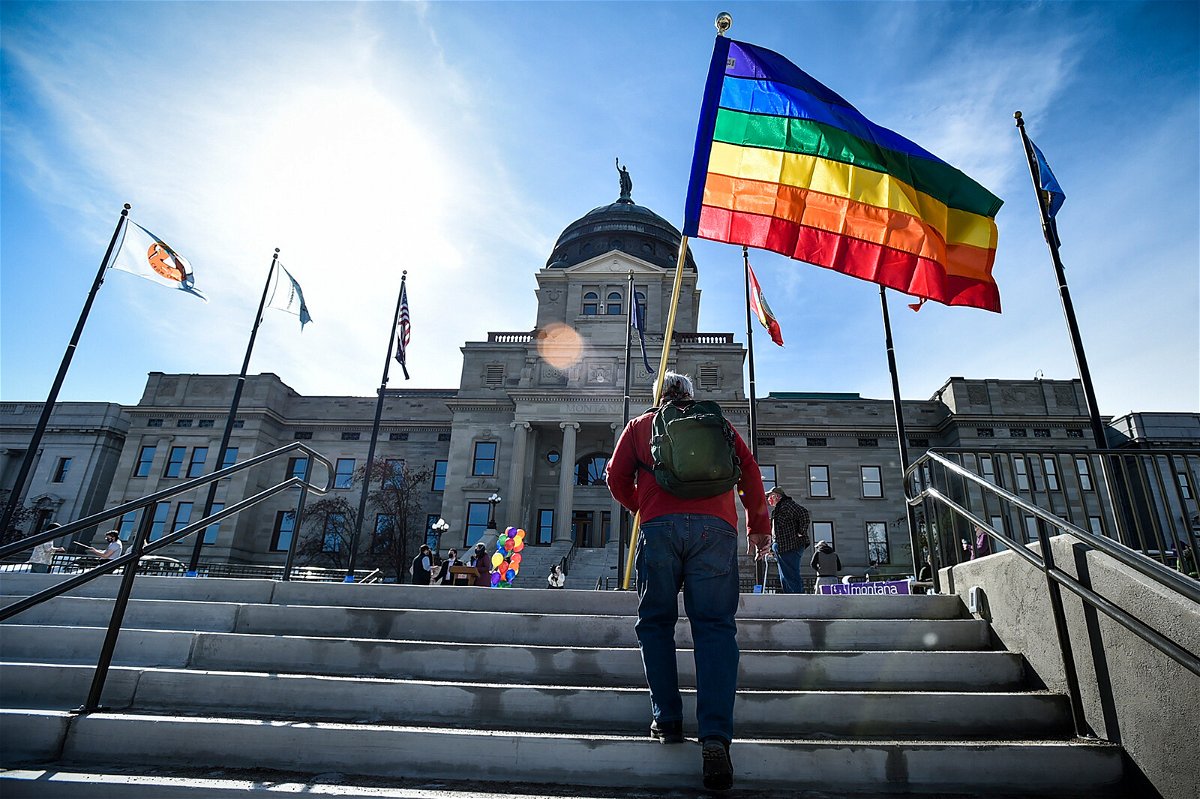 <i>Thom Bridge/Independent Record/AP</i><br/>Montana will comply with a court order requiring it to enforce a process that makes it easier for residents to change the sex designations on their birth certificates. Supporters of LGBTQ rights are pictured here on the steps of the Montana State Capitol.