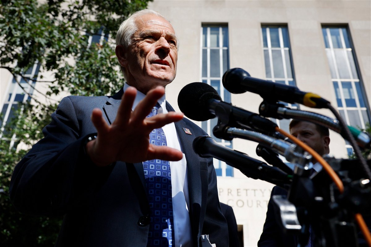 <i>Chip Somodevilla/Getty Images</i><br/>Former Trump White House adviser Peter Navarro talks briefly with reporters on August 31 in Washington