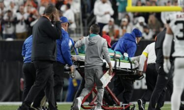 Miami Dolphins quarterback Tua Tagovailoa is taken off the field on a stretcher during the first half of an NFL football game against the Cincinnati Bengals