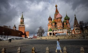 Senior US officials tell CNN they are disappointed US-led sanctions haven't had a bigger impact so far on the Russian economy. A woman is pictured here walking outside the Kremlin