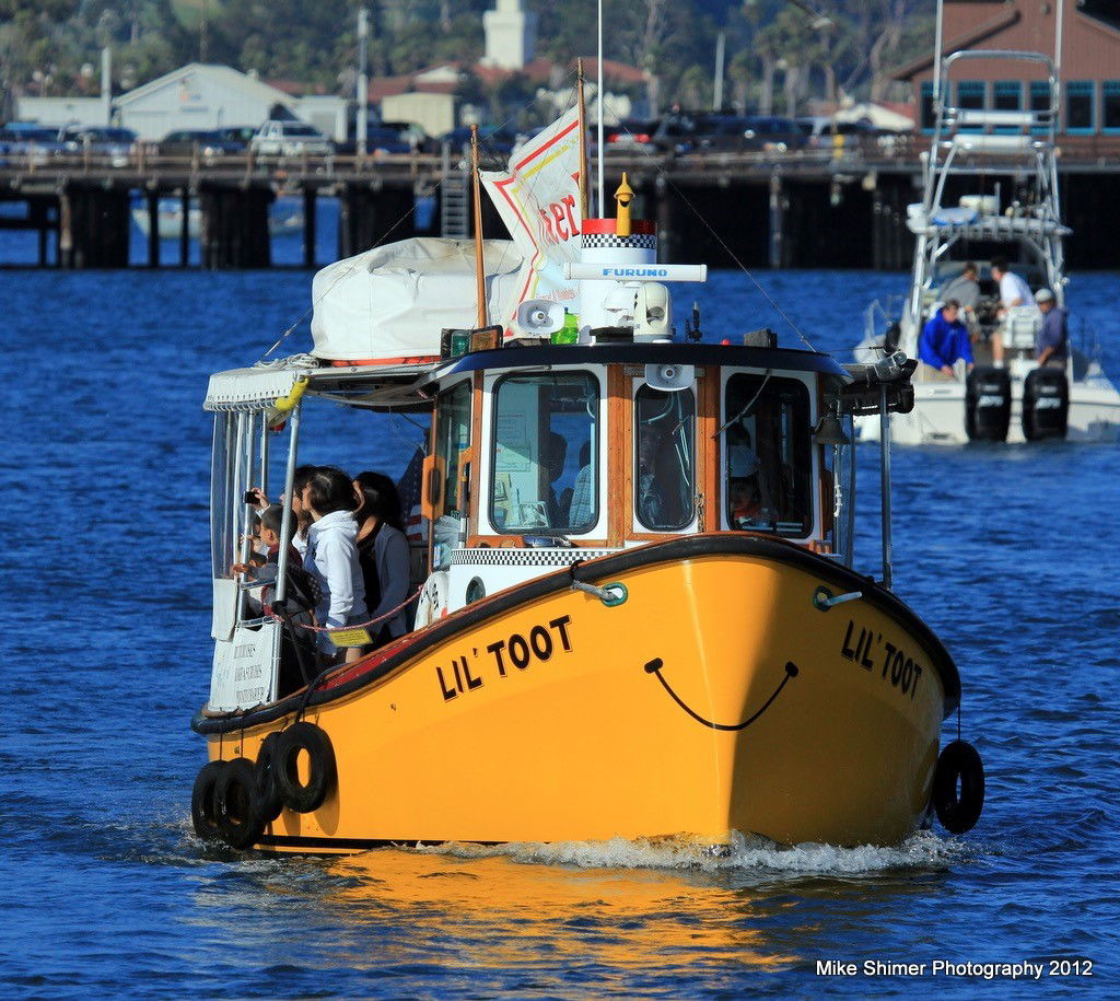 Children ride free on Lil' Toot boat at Santa Barbara in celebration of