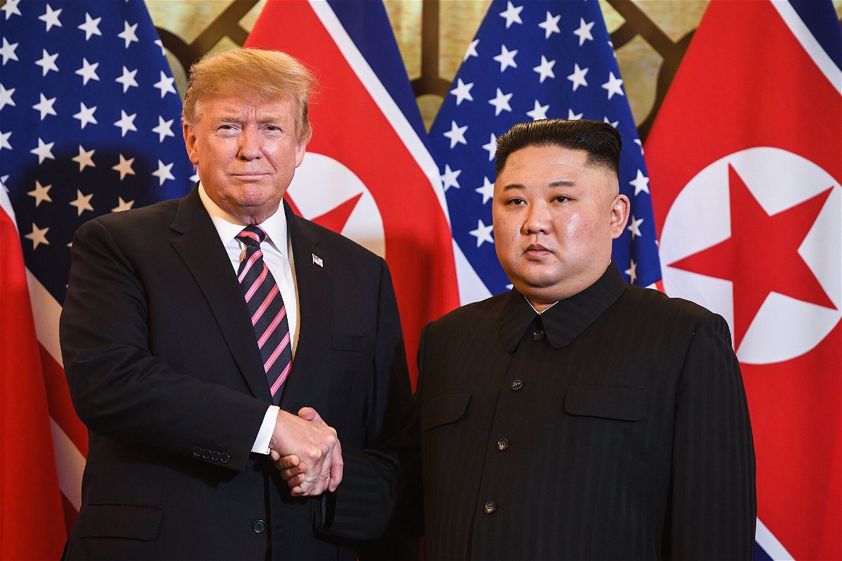 <i>Saul Loeb/AFP/Getty Images</i><br/>Then-President Donald Trump shakes hands with North Korea's leader Kim Jong Un before a meeting at the Sofitel Legend Metropole hotel in Hanoi on February 27