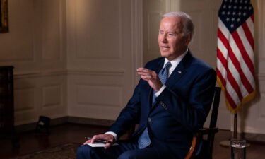 President Joe Biden speaks with CNN's Jake Tapper during an interview in the Map Room of the White House in Washington