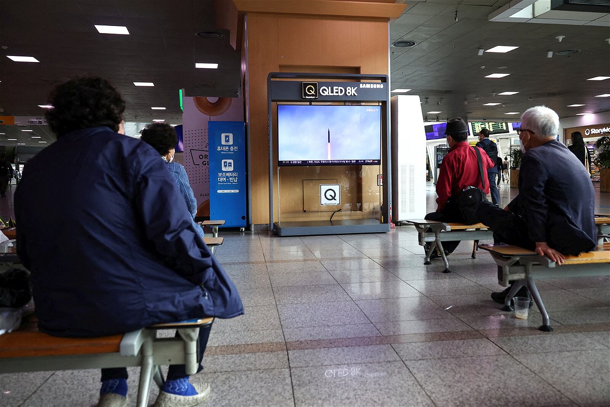 <i>Kim Hong-Ji/Reuters</i><br/>North Korea fired a ballistic missile without warning over Japan on October 4 for the first time in five years. People are seen here watching a TV broadcasting a news report on the missile