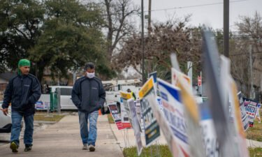People walk to cast their primary ballots at the Moody Community Center on February 24 in Houston
