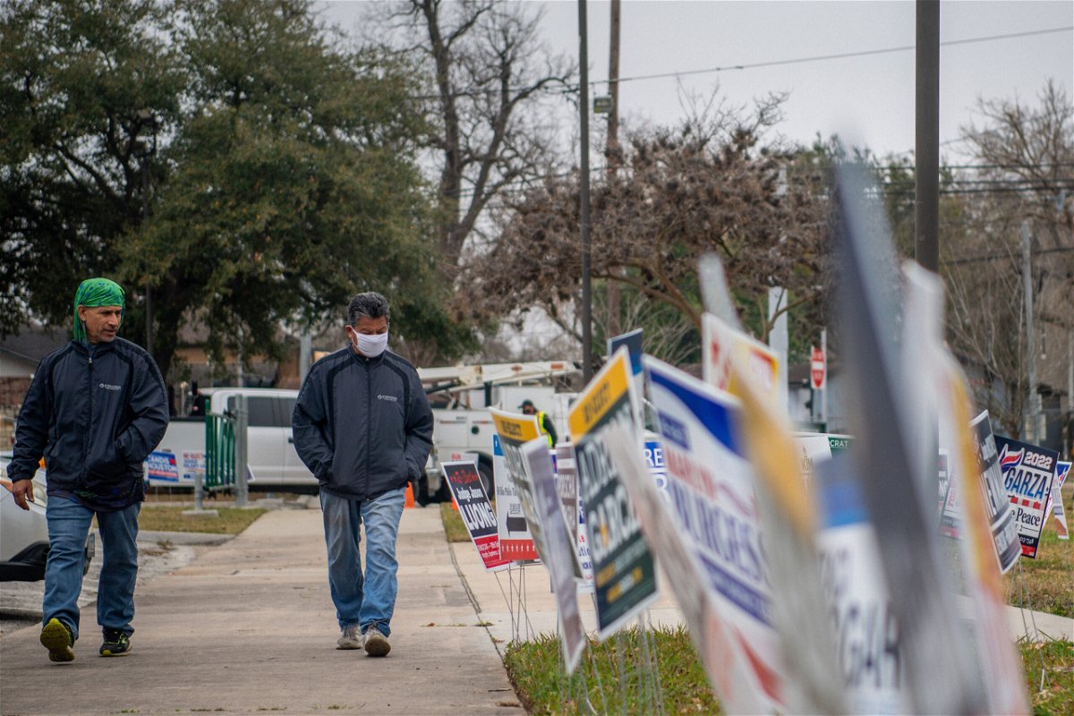 <i>Brandon Bell/Getty Images</i><br/>People walk to cast their primary ballots at the Moody Community Center on February 24 in Houston