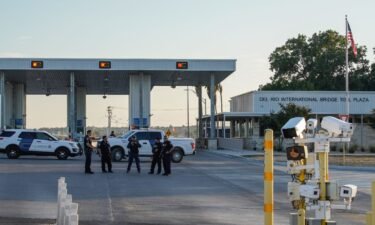US Customs and Border Protection agents guard the entrance to the Del Rio International Bridge. The Biden administration is considering a new program to encourage Venezuelan migrants to go to US ports of entry instead of unlawfully crossing the southern border.
