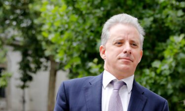 Former UK intelligence officer Christopher Steele arrives at the High Court in London in July 2020. The FBI offered retired Steele "up to $1 million" to prove the explosive allegations in his dossier about Donald Trump.