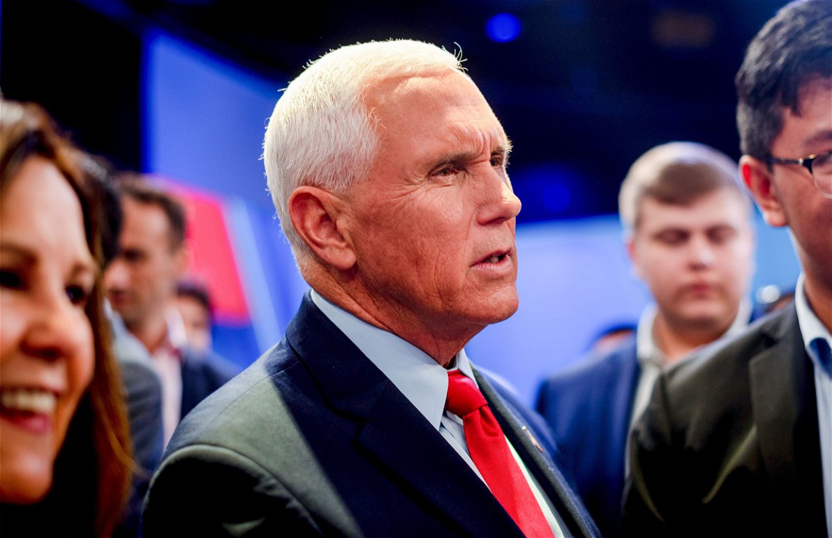 <i>Hilary Swift/CNN</i><br/>Former Vice President Mike Pence is seen here with audience members after appearing at at CNN town hall in Manhattan. Pence said on November 28 that Donald Trump was 