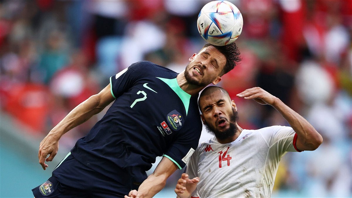 <i>Robert Cianflone/Getty Images</i><br/>Mathew Leckie of Australia competes for a header against Aissa Laidouni of Tunisia during Group D match between Tunisia and Australia.