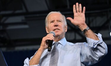 The story of President Joe Biden's Election Night can be told by the two congratulatory messages he delivered roughly four hours apart. President Biden is seen here speaking at a rally for gubernatorial candidate Wes Moore in Bowie