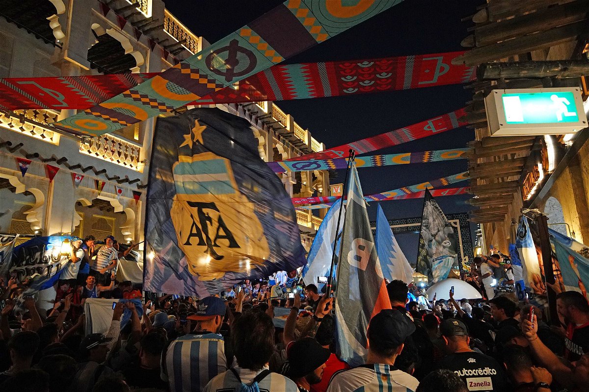 <i>Peter Byrne/PA Images/Getty Images</i><br/>Argentina fans enjoy the atmosphere at the Souq Waqif in Doha.