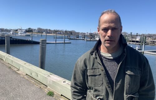 Author Sebastian Junger stands outside Cape Cod Hospital