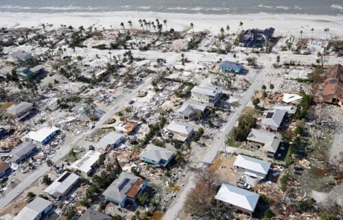 This aerial photo shows damaged homes and debris in the aftermath of Hurricane Ian