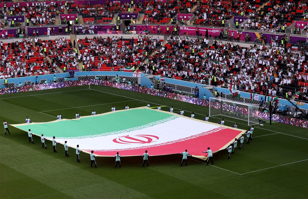 <i>Catherine Ivill/Getty Images</i><br/>A giant flag of IR Iran on the pitch prior to the FIFA World Cup Qatar 2022 Group B match between Wales and Iran at Ahmad Bin Ali Stadium on November 25