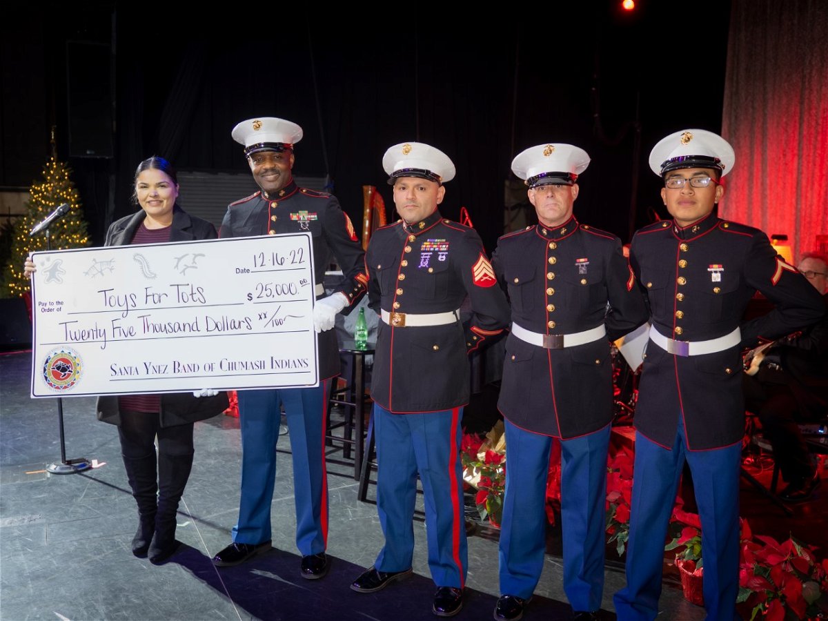 Left to Right: Chumash Foundation Director Teresa Sat and members of the Marine Corps League 1340 at the Chumash Casino Resort Dec. 16, 2022