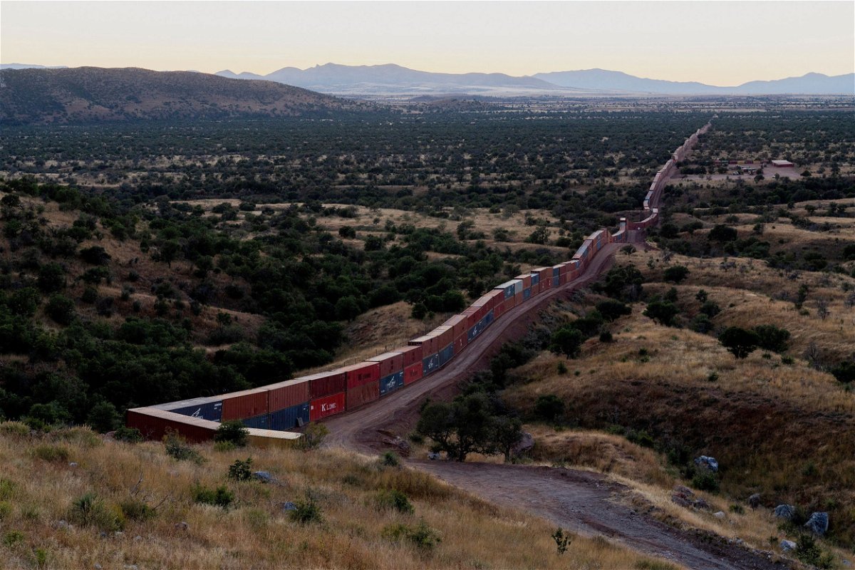 <i>Thomas Machowicz/Reuters</i><br/>A view of shipping containers from the border wall on the frontier with Mexico in Cochise County