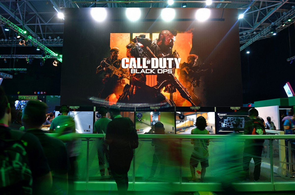 <i>Carl de Souza/AFP/Getty Images</i><br/>Gamers play the latest Call of Duty game.