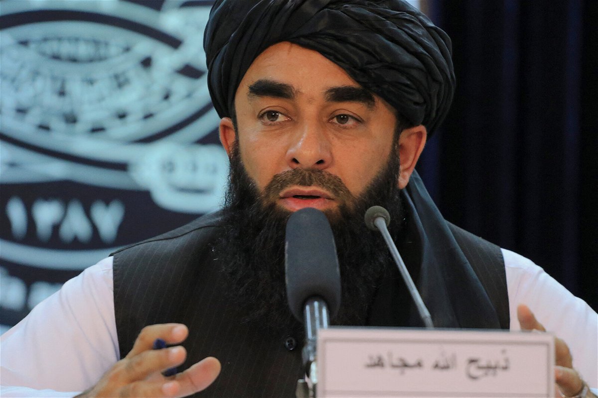 <i>Stringer/AFP/Getty Images</i><br/>Taliban carry out first public execution since returning to power in Afghanistan. Taliban spokesman Zabihullah Mujahid is pictured here in Kabul on November 5.