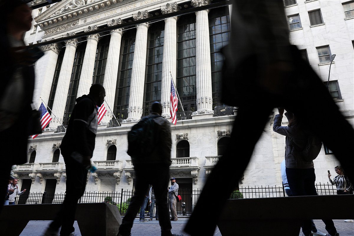 <i>Spencer Platt/Getty Images</i><br/>Public perception of the U.S. economy remains grim. People walk outside of the New York Stock Exchange on September 23
