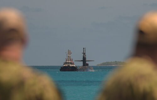 The US Navy sends a message to adversaries with a rare submarine port visit in Indian Ocean. Ohio-class ballistic-missile submarine USS West Virginia is pictured conducting a port visit at U.S. Navy Support Facility Diego Garcia.