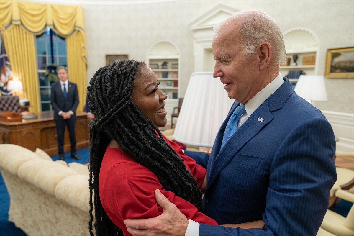 <i>Adam Schultz/The White House/Getty Images</i><br/>President Joe Biden meets Cherelle Griner (left) about the release of her wife Brittney Griner on December 8 in the Oval Office.