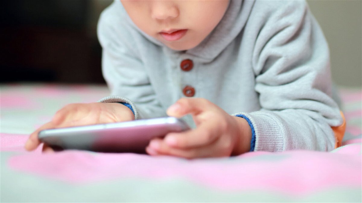 <i>NI QIN/E+/Getty Images</i><br/>Using media on smartphones and TV to quell tantrums can stifle learning about emotional regulation