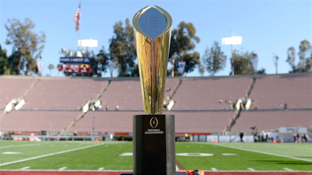 <i>Kevork Djansezian/Getty Images</i><br/>The College Football Playoff will expand from four to 12 teams starting with the 2024-2025 season. The National Championship Trophy is pictured on January 1