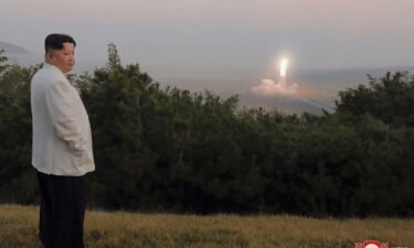 Kim Jong Un inspects a missile test in a photo provided by the North Korean government and said to have been taken sometime between Sept. 25 and Oct. 9.