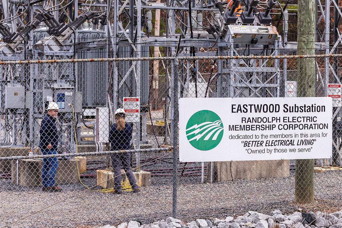 <i>Travis Long/AP</i><br/>Workers with Randolph Electric Membership Corporation work Tuesday to repair the Eastwood Substation in West End