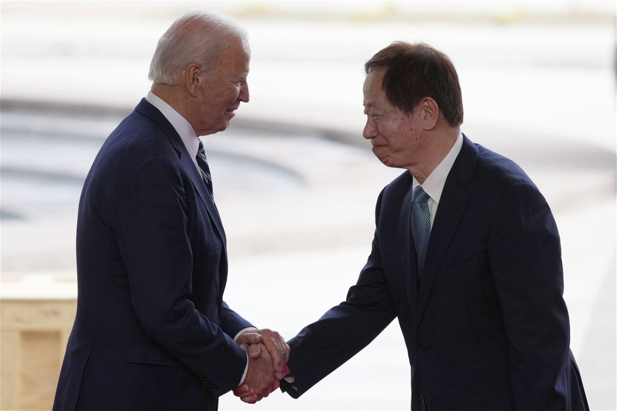 <i>Ross D. Franklin/AP</i><br/>US President Joe Biden and Taiwan Semiconductor Manufacturing Company Chairman Mark Liu after touring the TSMC facility under construction in Phoenix