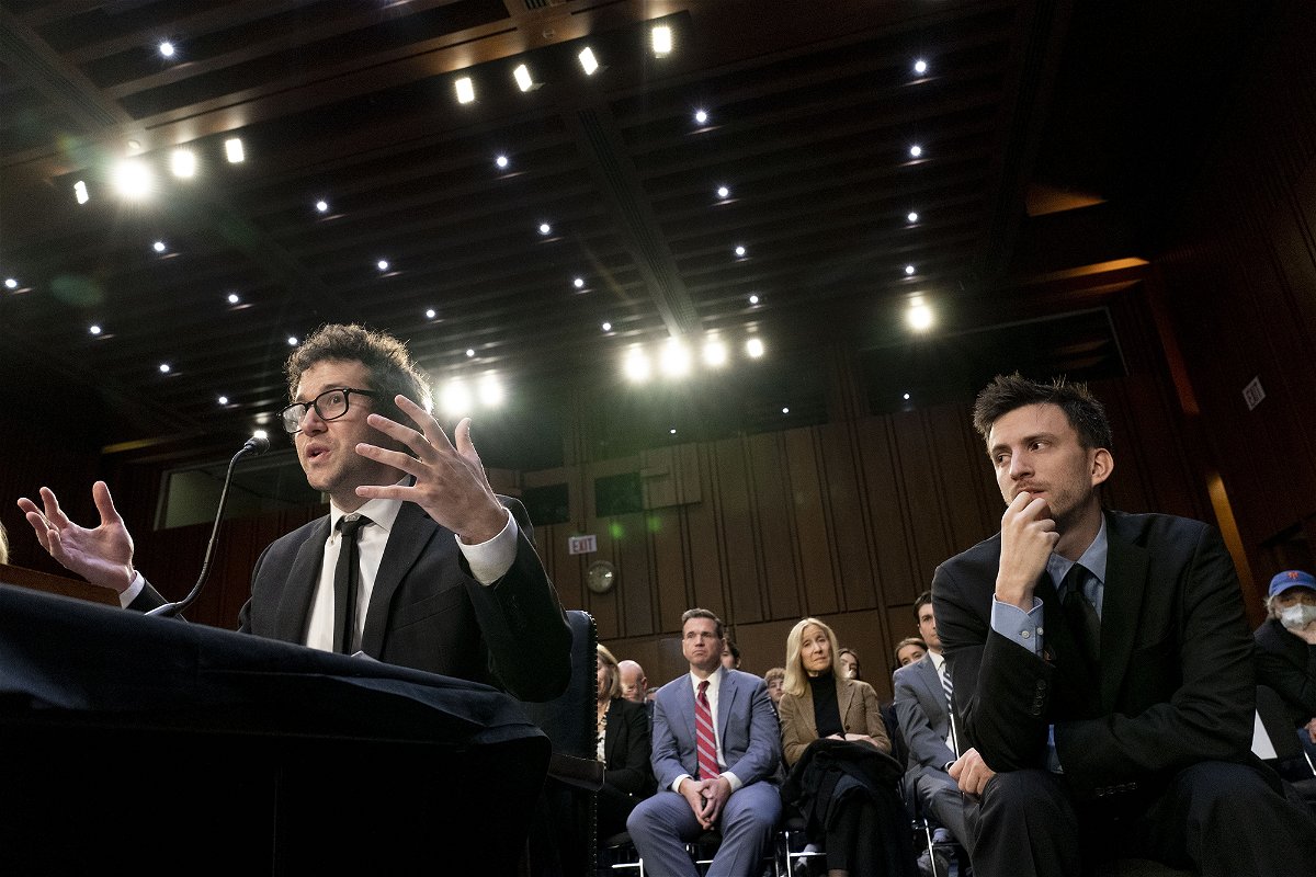 <i>Andrew Harnik/AP</i><br/>Bandmate Jordan Cohen (right) listens as singer-songwriter Clyde Lawrence (left) testifies before a Senate Judiciary Committee hearing on January 24 to examine promoting competition and protecting consumers in live entertainment.