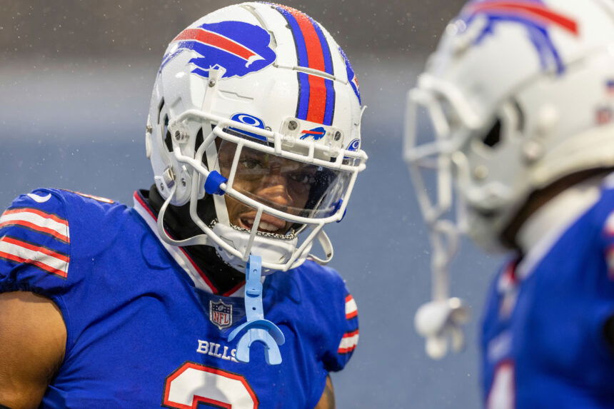 The Buffalo Bills Helmet Is Shown Against A Dark Background