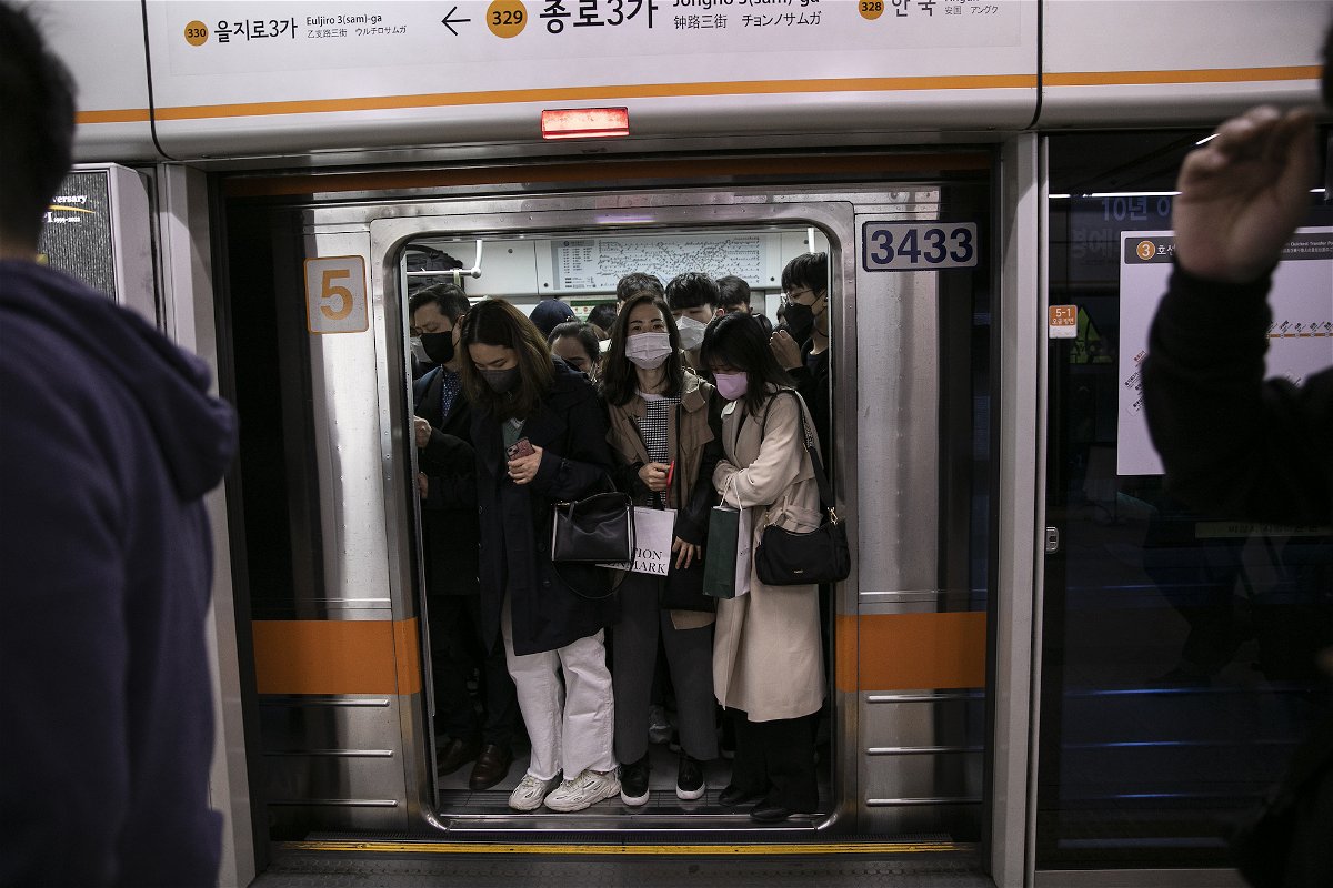 <i>Woohae Cho/Bloomberg/Getty Images</i><br/>Masks will still be required on public transport and in health facilities after South Korea eases its indoor mask mandate on January 30