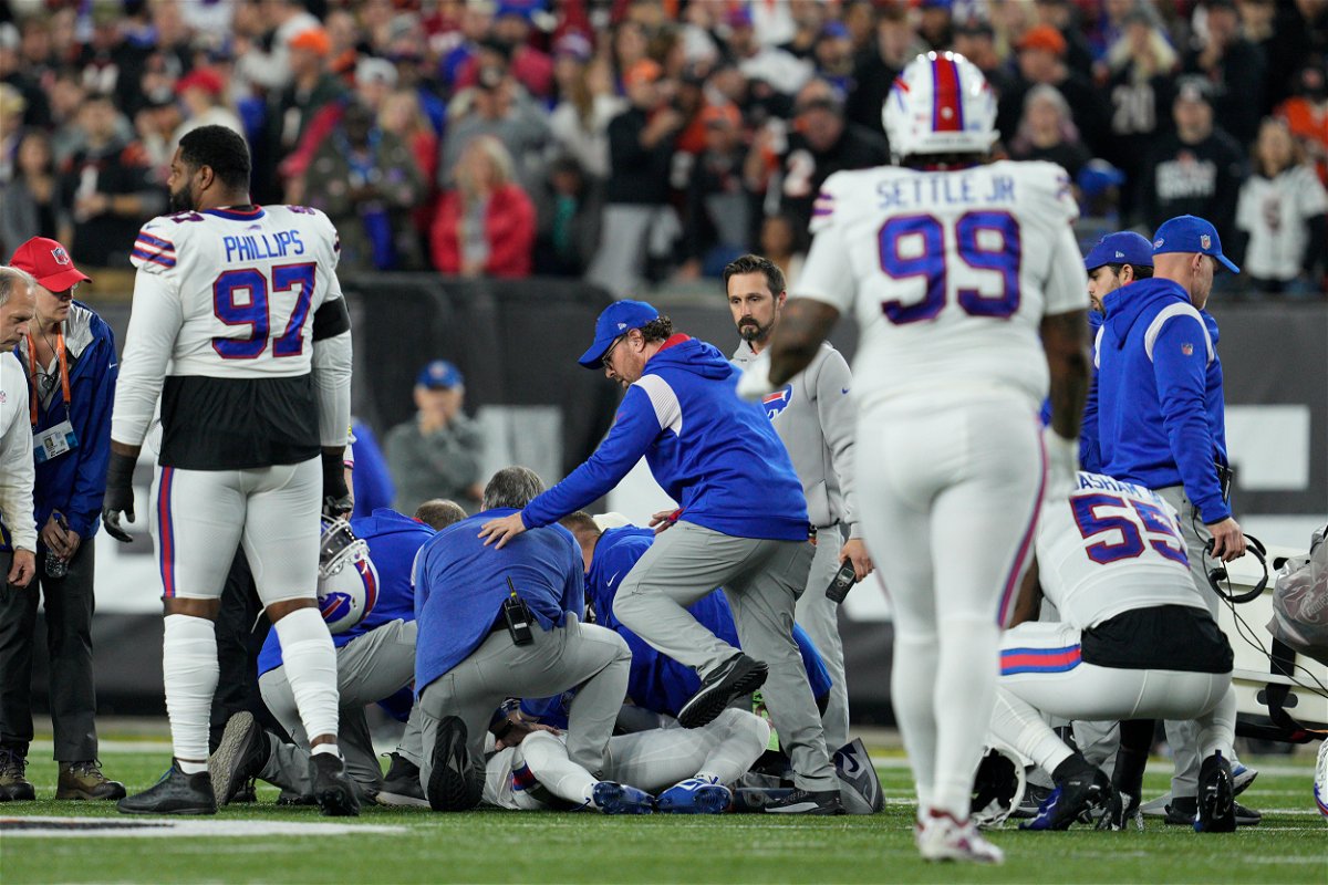 <i>Jeff Dean/AP</i><br/>Hamlin is examined after collapsing on the field in the first quarter of Monday night's game between the Buffalo Bills and Cincinnati Bengals.