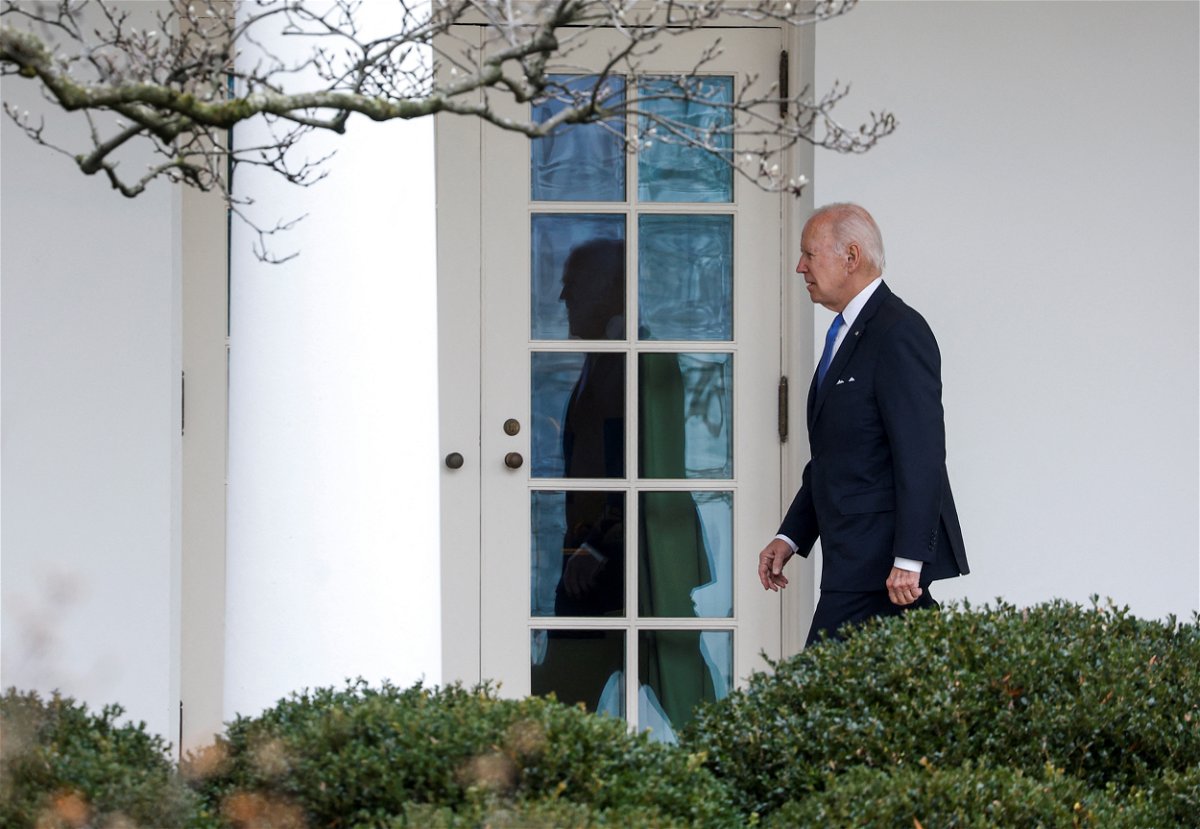 <i>Evelyn Hockstein/Reuters</i><br/>President Joe Biden walks to the Oval Office on January 23