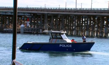A police boat patrols the Swan River in the Perth suburb of Fremantle