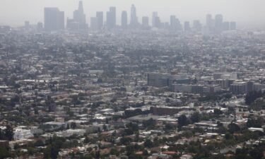 Smog hangs over the city of Los Angeles on a day rated as having 'moderate' air quality in June of 2019.