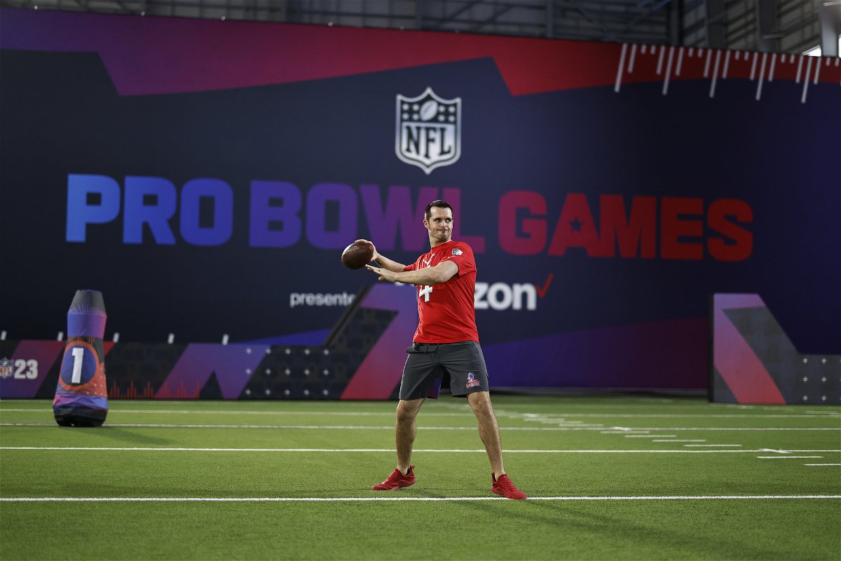 <i>Michael Owens/Getty Images</i><br/>AFC quarterback Derek Carr passes during the Pro Bowl Games skills events.