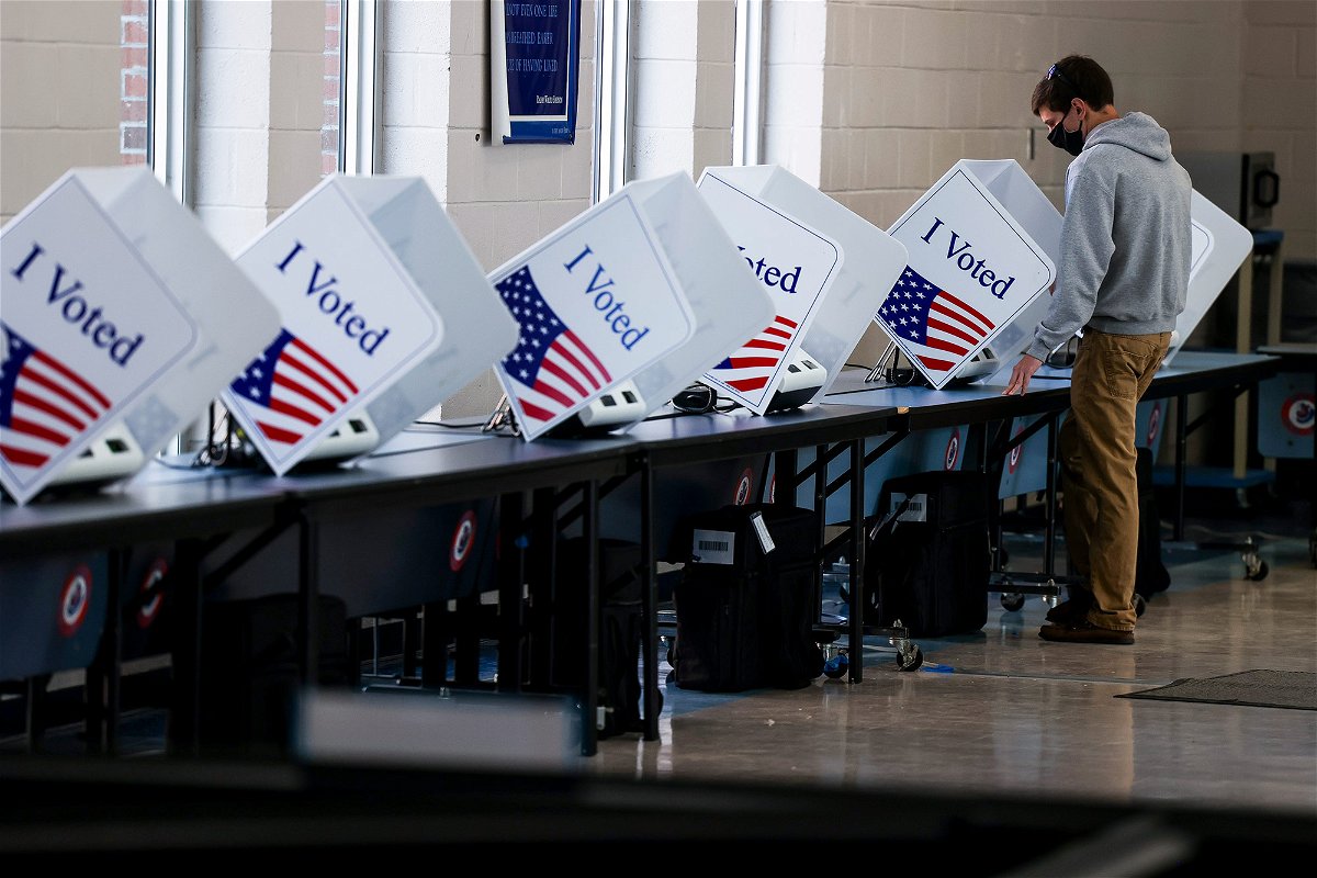 <i>Michael Ciaglo/Getty Images</i><br/>A man votes at a high school in Charleston