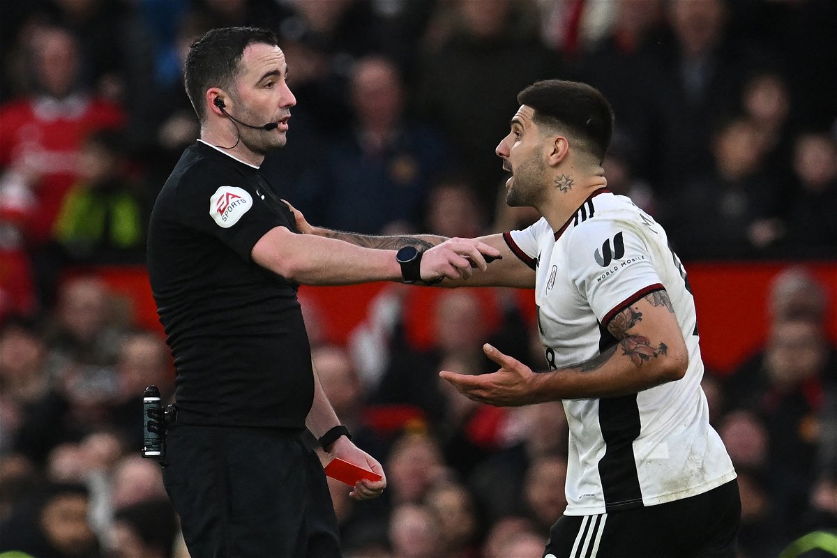 <i>Paul Ellis/AFP/Getty Images</i><br/>Fulham striker Aleksandar Mitrovic argues with referee Chris Kavanagh before getting sent off.