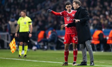 Julian Nagelsmann (right) gives instructions to Bayern's Jamal Musiala during the UEFA Champions League on February 14 in Paris